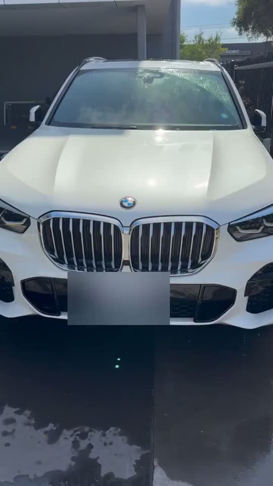 Freshly washed white BMW