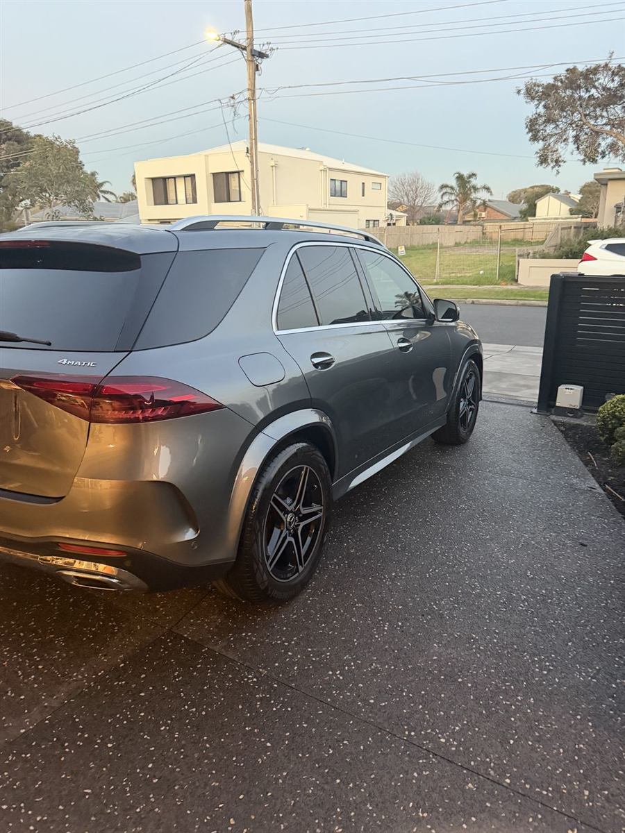 Freshly hand-washed Mercedes-Benz, side view